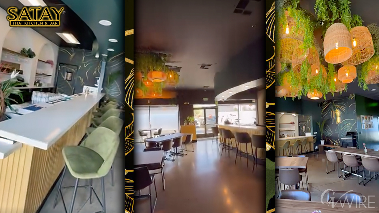 Satay Thai Kitchen & Bar dining room with rattan chandeliers and emerald velvet bar